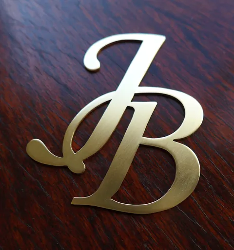 מונוגרם "JB" פונט: Monotype Corsiva