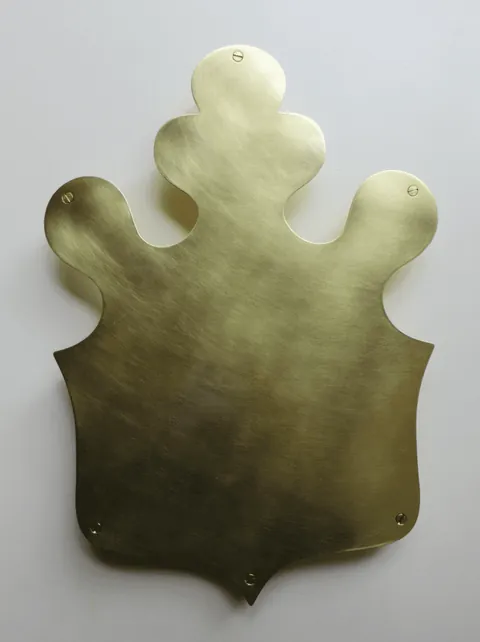 brass shield