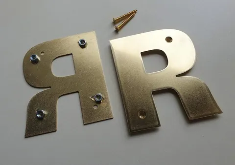 brass letters backside spacers