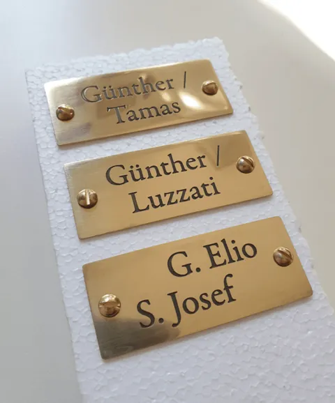 very small brass engraved plaques